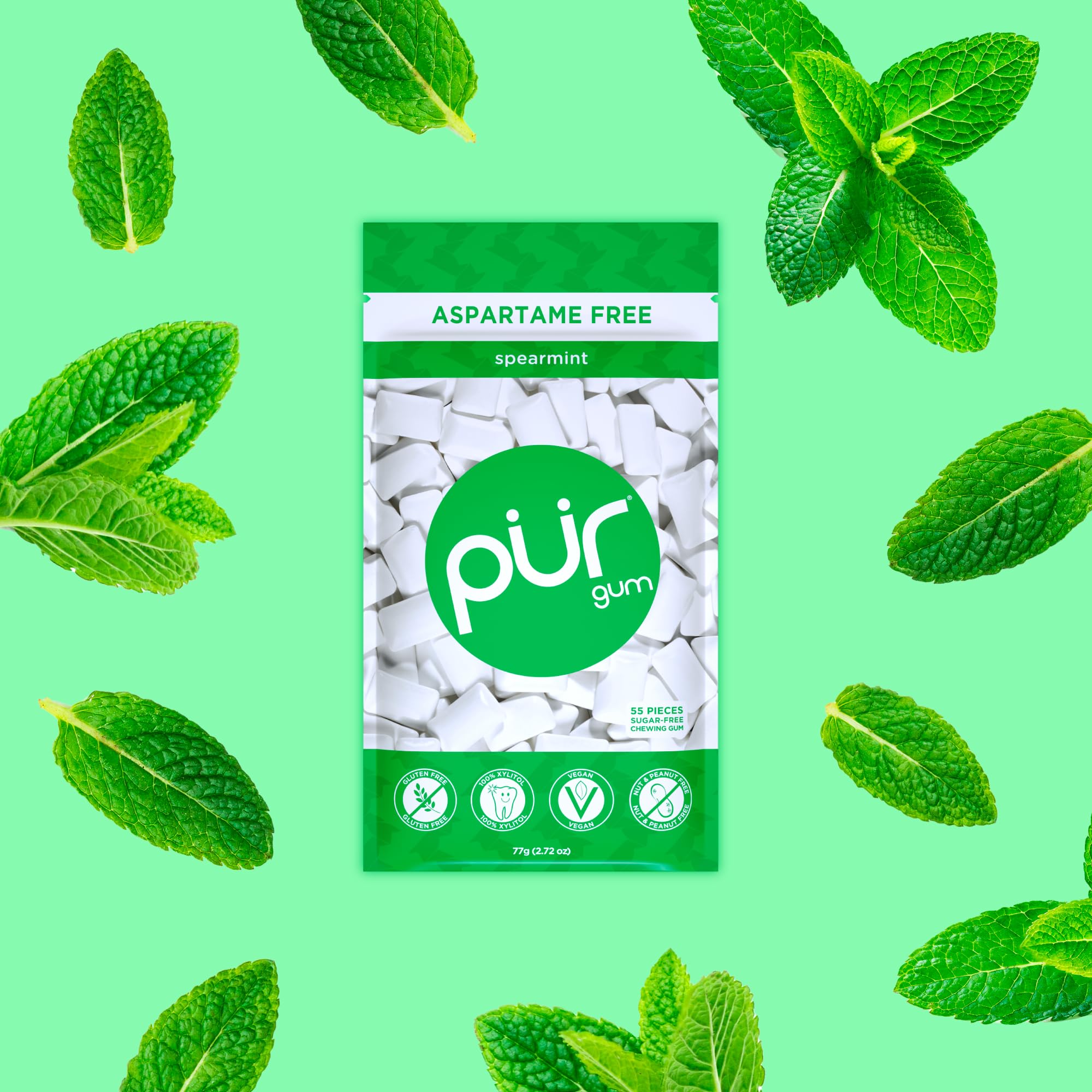 Close-up of a PUR Gum spearmint piece showing smooth texture and consistent chew