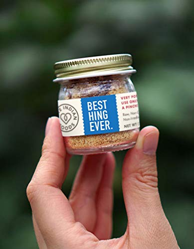 PURE INDIAN FOODS jar on kitchen counter with cooked dal showing real-use application