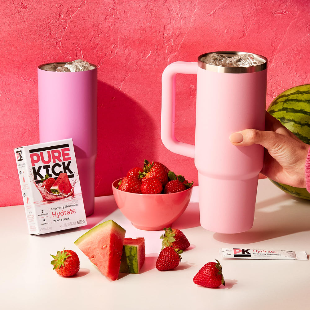 PURE KICK mixed drink in bottle demonstrating refreshing flavored hydration benefit