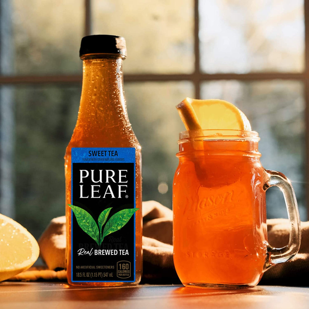 Pure Leaf bottle held in hand illustrating 18.5 fl oz portable size