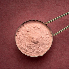 PURE ORIGINAL INGREDIENTS powder stirred into smoothie demonstrating quick blending and flavor boost