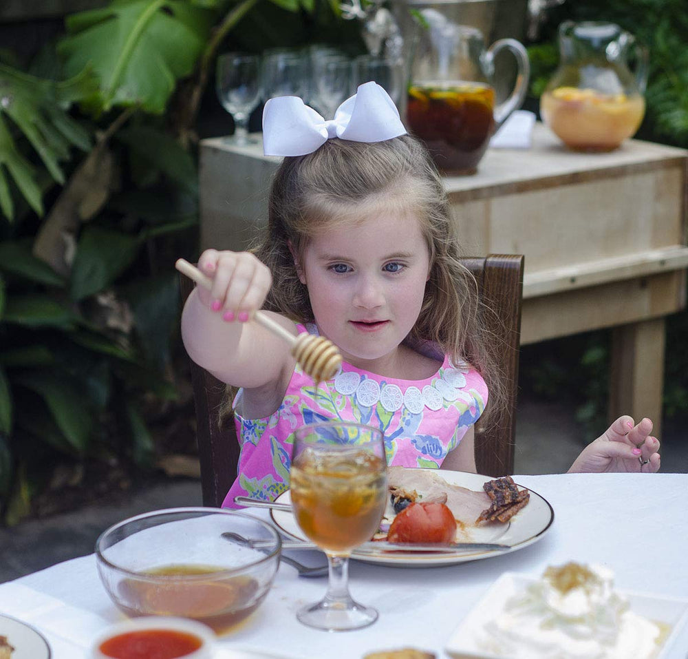 Pure Southern Honey on a cheese board illustrating gourmet pairing benefit