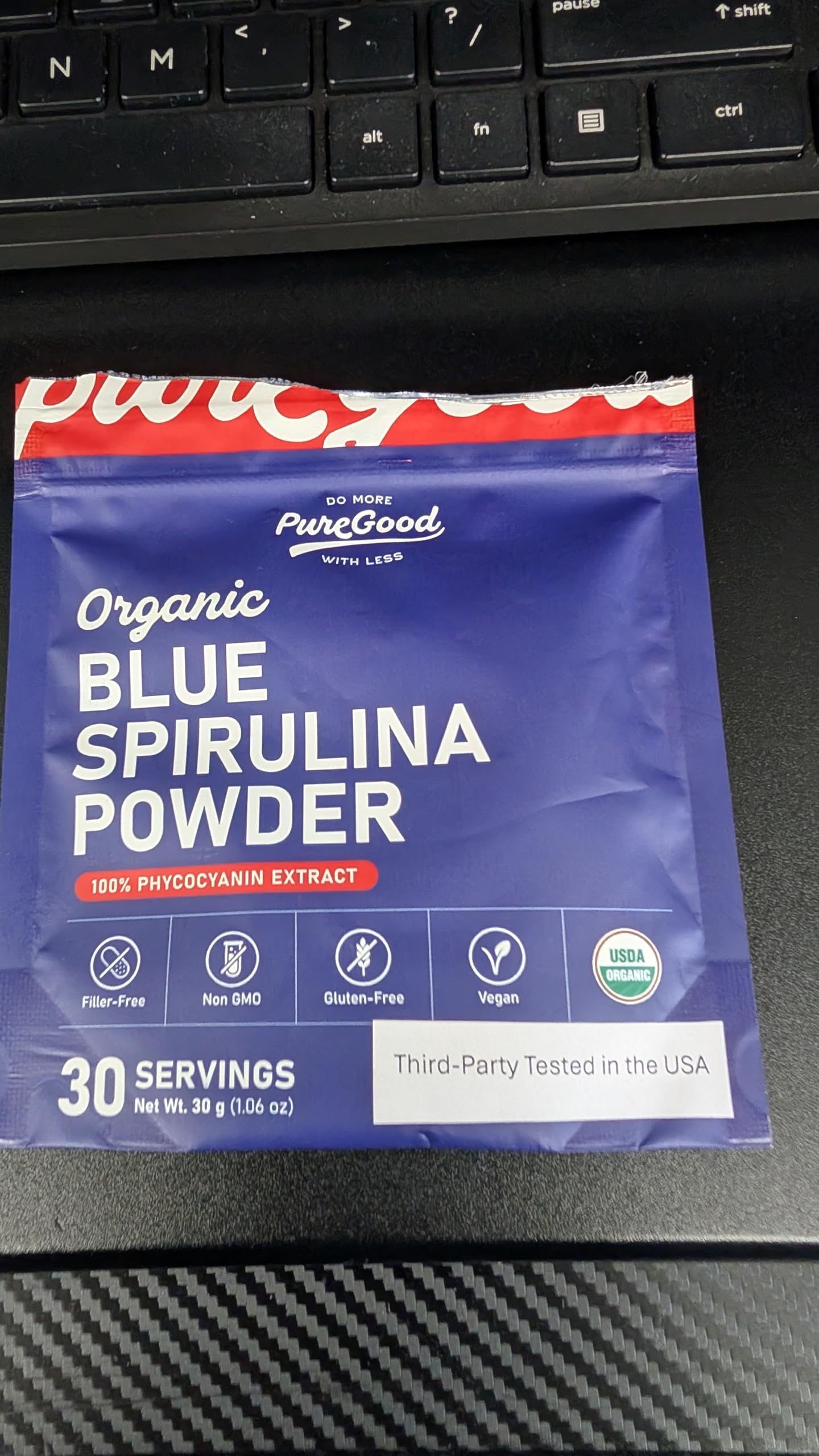 Kitchen scene with PureGood blue spirulina and ingredients for creative recipes