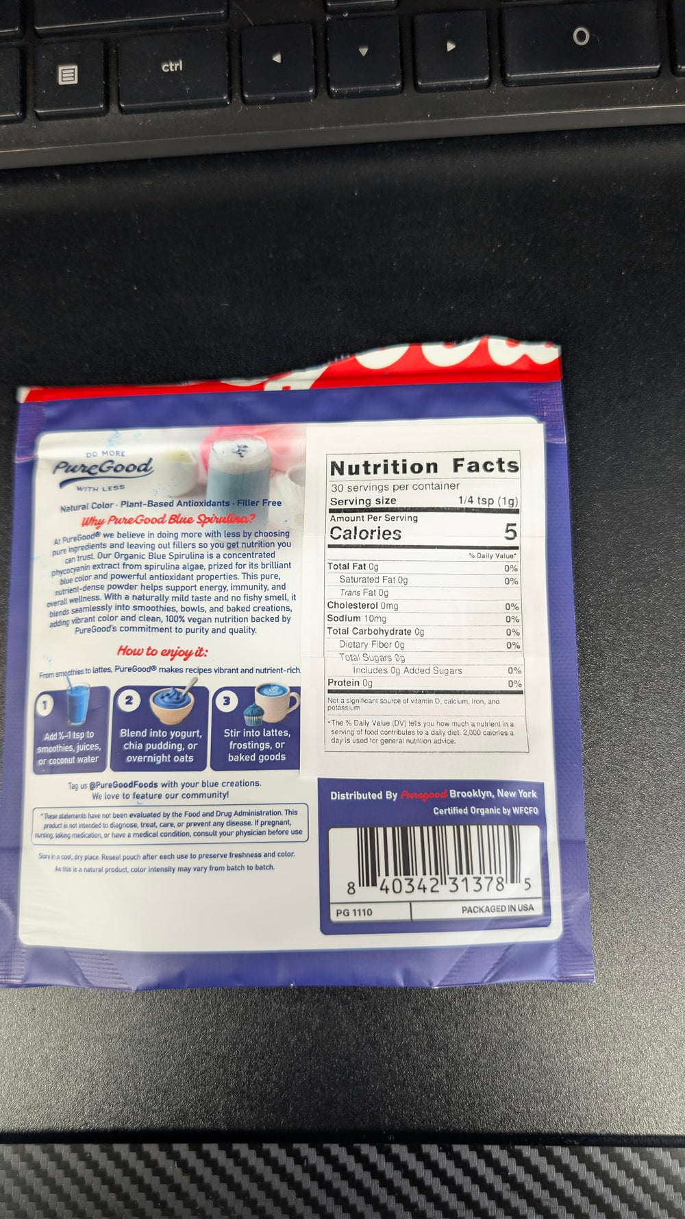 Measured teaspoon of PureGood blue spirulina showing portion control and ease