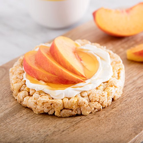Quaker apple cinnamon rice cake served with fruit for breakfast boost