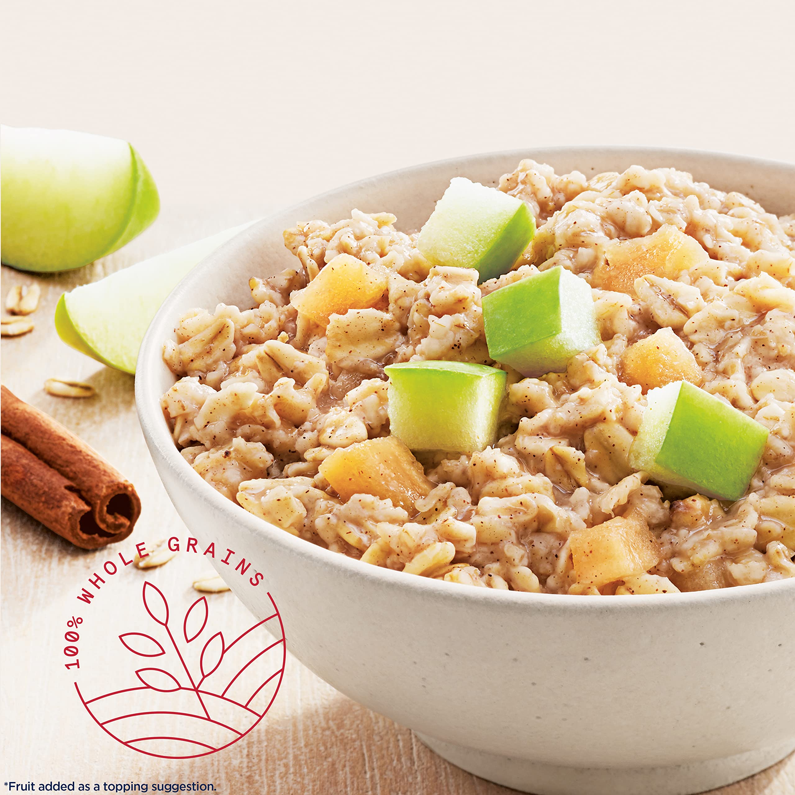 Close-up of a Quaker packet with visible apple pieces and oats highlighting flavor