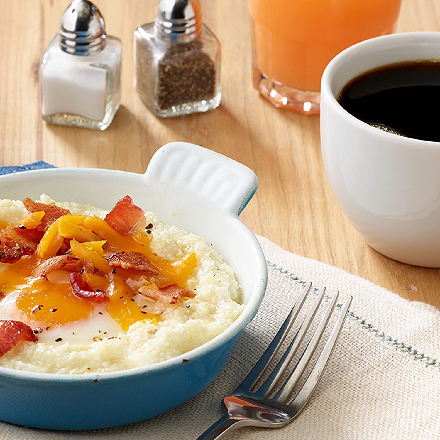 Quaker Country Bacon grits on table providing smoky flavorful option
