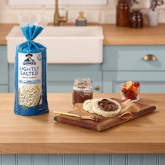 Quaker rice cake topped with peanut butter showing quick nutritious snack