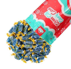 QUEEN CITY CANDY CAVE hand holding single wrapped piece for portion control and portability