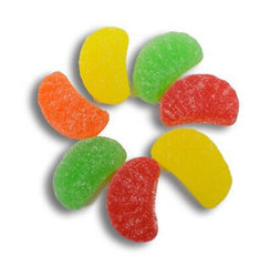 QUEEN CITY CANDY CAVE fruit slices in a glass bowl ready to serve, adding colorful garnish and snackable appeal