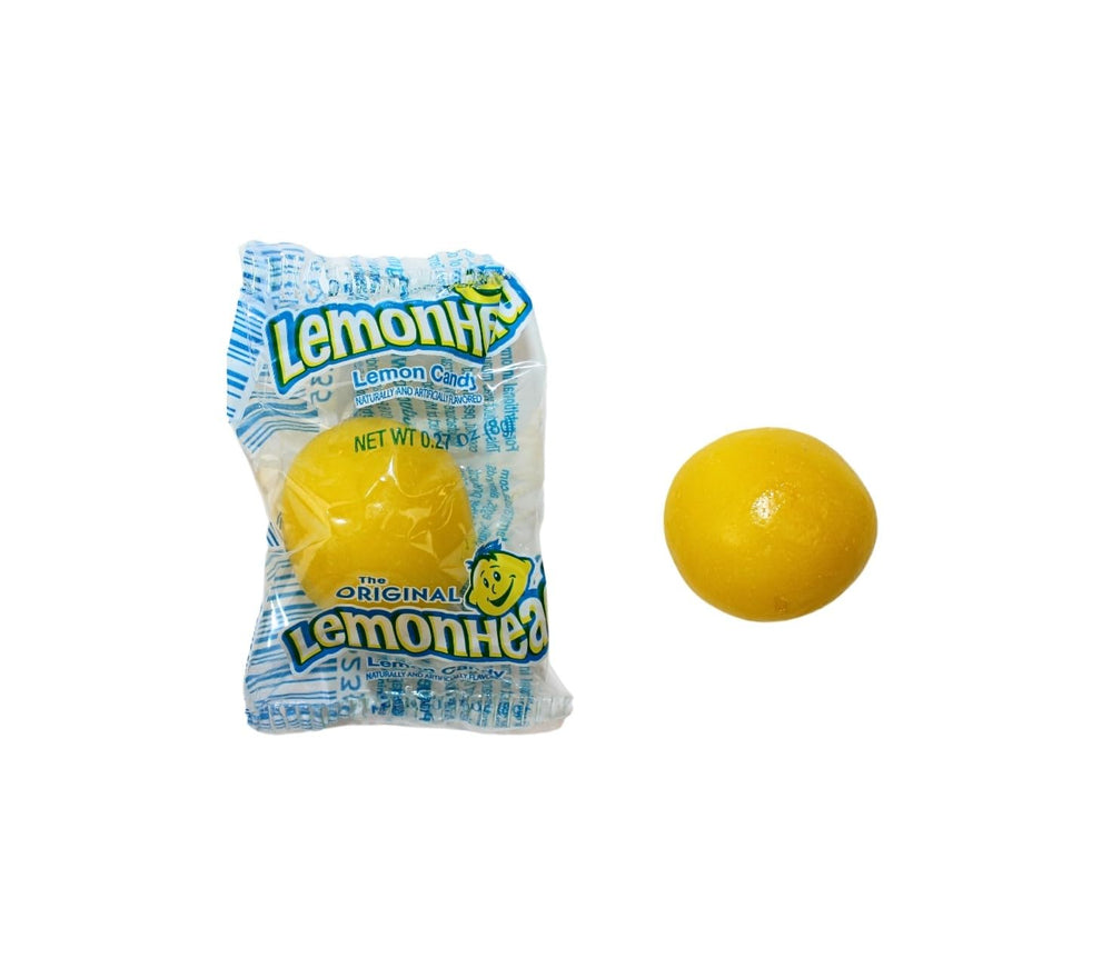 QUEEN CITY CANDY CAVE individually wrapped Lemon Heads emphasizing convenient sharing