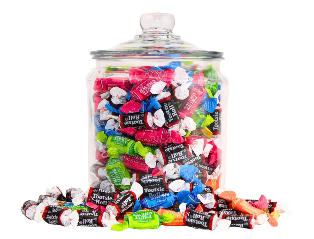 QUEEN CITY CANDY CAVE mini roll beside ruler, shows compact size and portion control