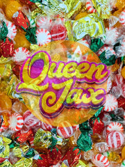 QUEEN JAX candy bowl display in a party setting inviting guests to grab treats