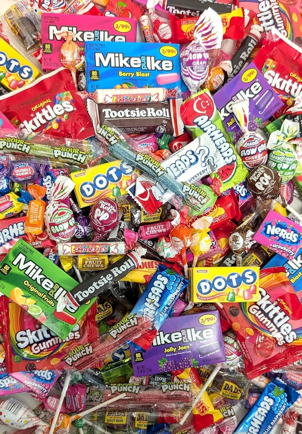 QUEEN JAX close-up of mixed individually wrapped candies — clear variety and freshness
