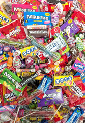 QUEEN JAX close-up of mixed individually wrapped candies — clear variety and freshness