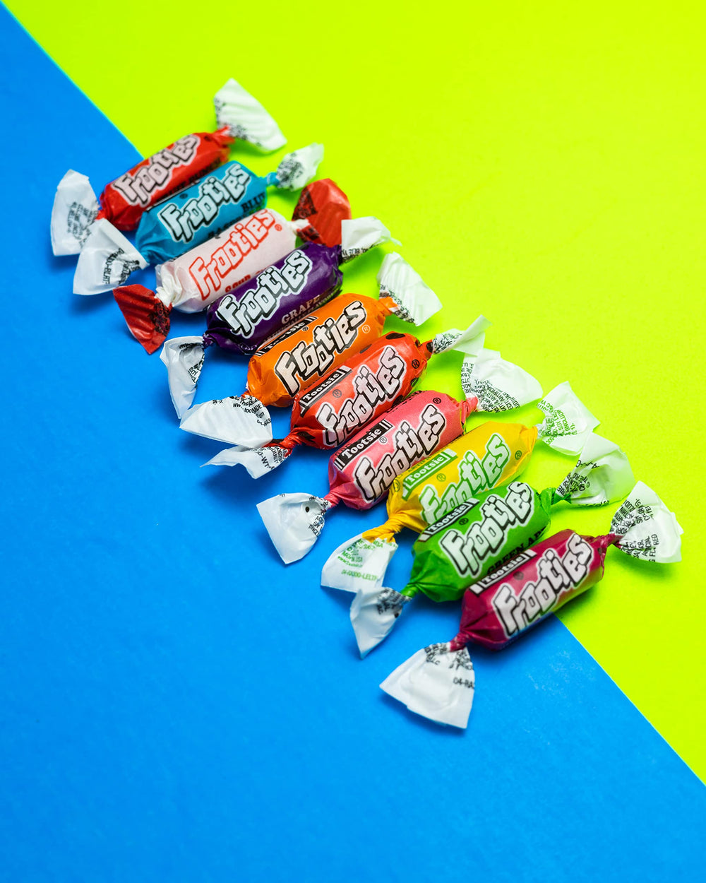 QUEEN JAX individually wrapped pieces spread to demonstrate hygiene and portions