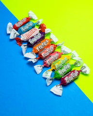QUEEN JAX individually wrapped pieces spread to demonstrate hygiene and portions