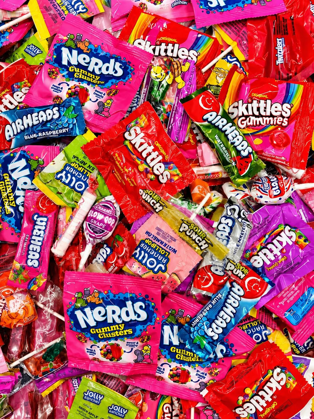 Queen Jax lollipops and jelly beans arranged to show colorful selection