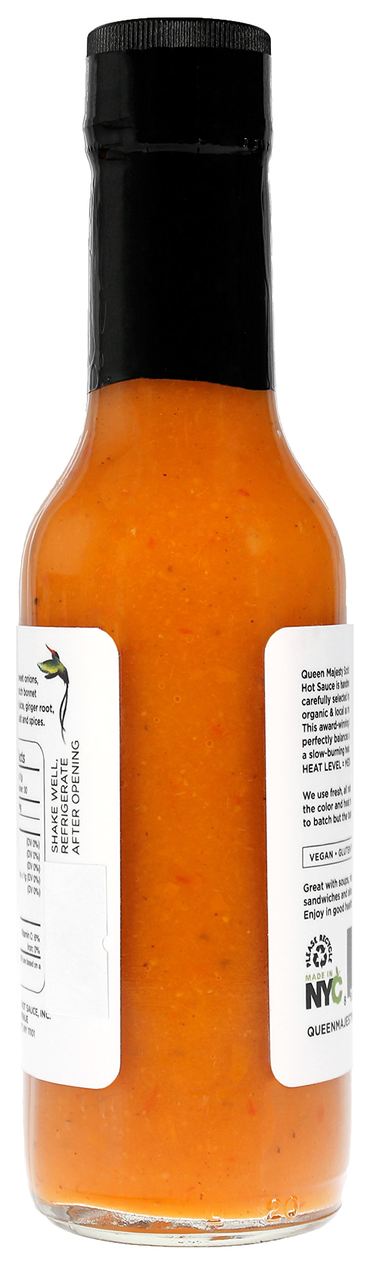 Queen Majesty pouring over wings to show vibrant finish and enhanced taste