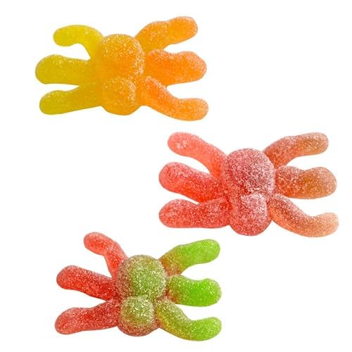 QUEEN CITY CANDY CAVE gummy spiders floating in punch creating playful themed beverage garnish