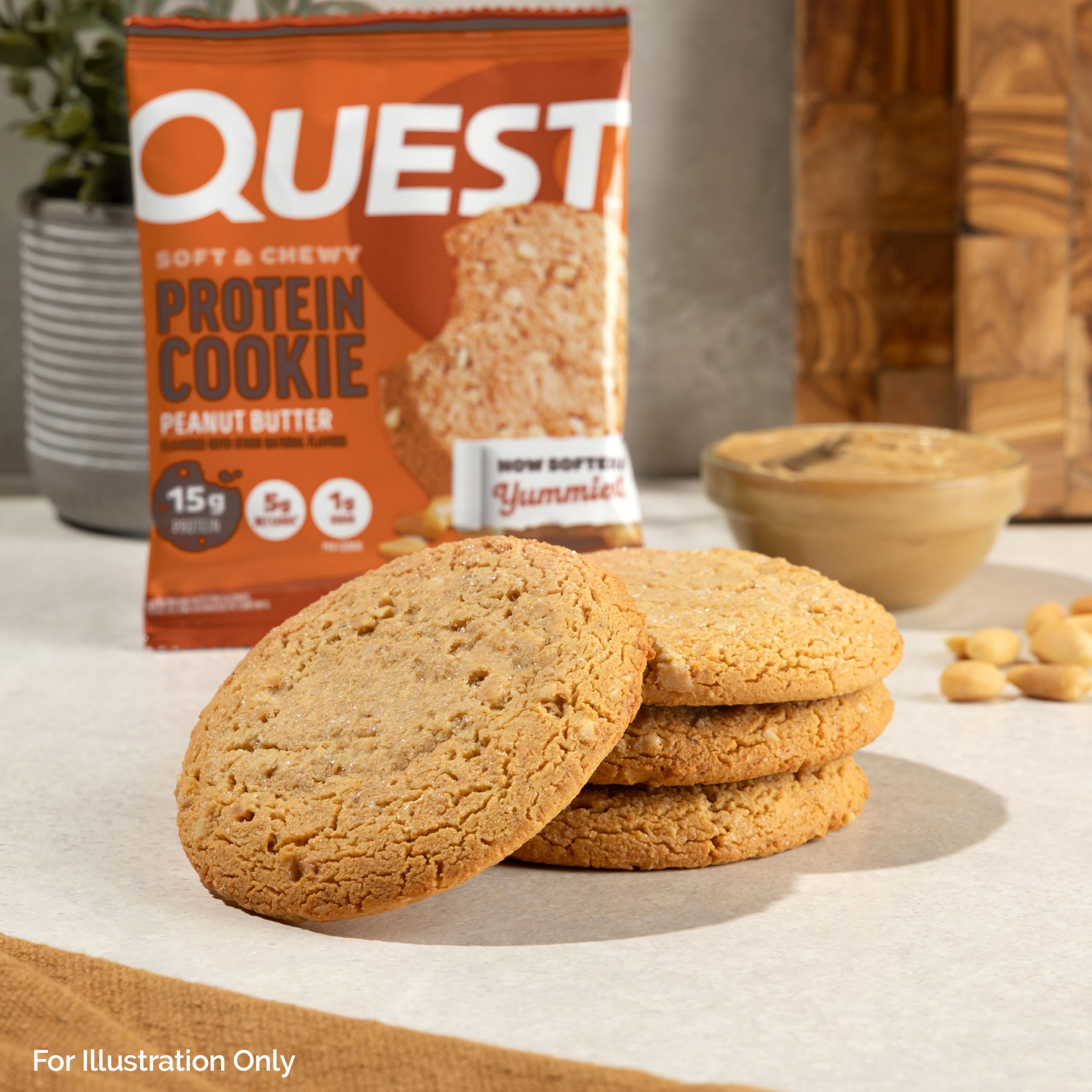 Quest cookie held in hand to show size and portability for on-the-go protein boost