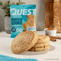 Quest split cookie with crumbs displaying interior softness and spices