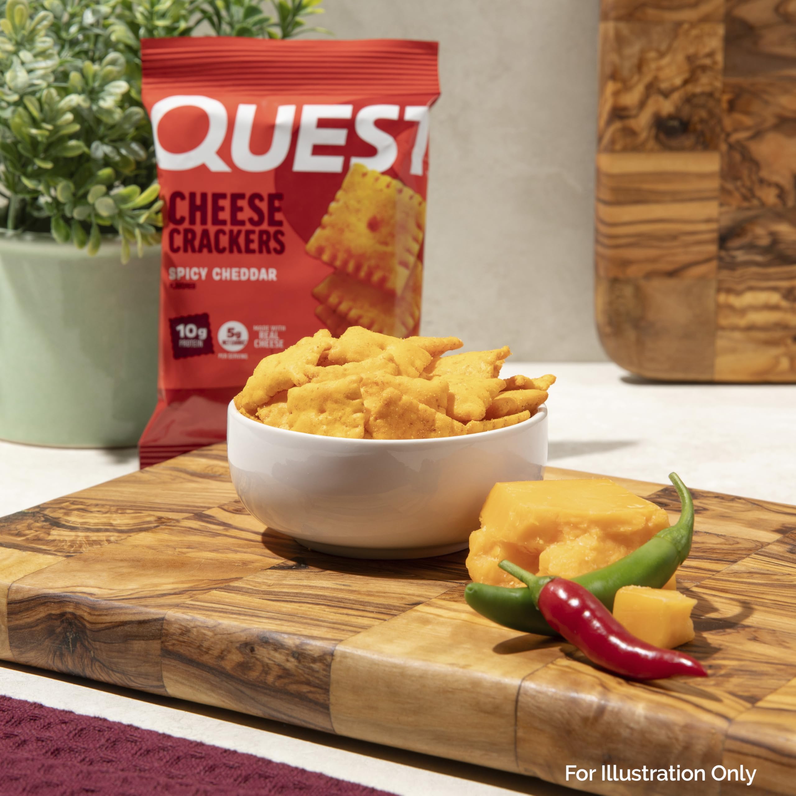 Quest crackers in hand showing portion size and portable benefit