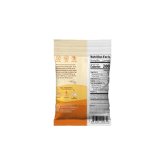 Quinn hand holding single 1.5 oz pack illustrating portable snack convenience