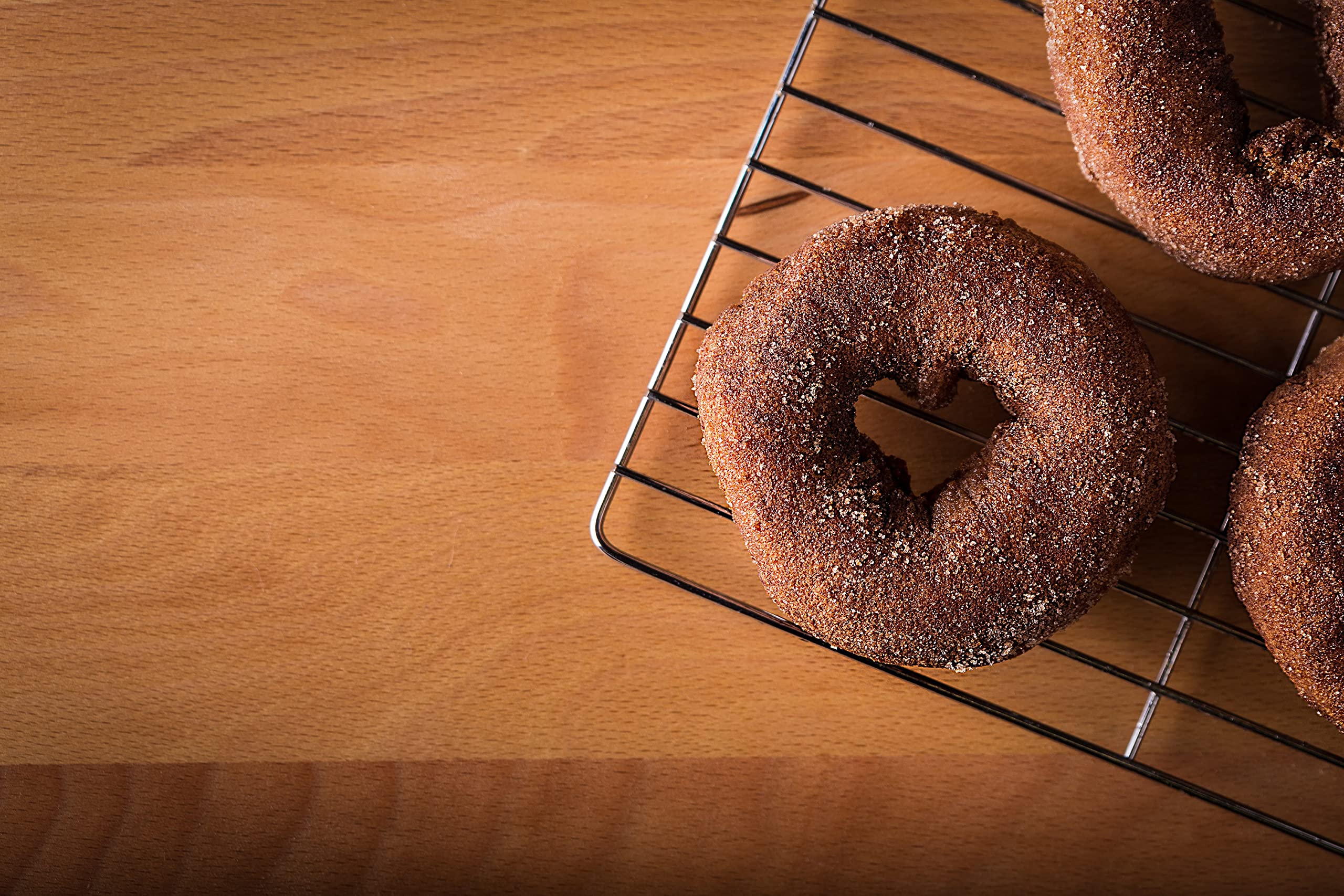 Rabbit Creek baked donuts in a greased donut pan showing easy oven-ready preparation benefit