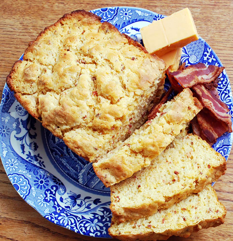 Rabbit Creek cheesy garlic loaf with garlic cloves, conveys robust garlic flavor