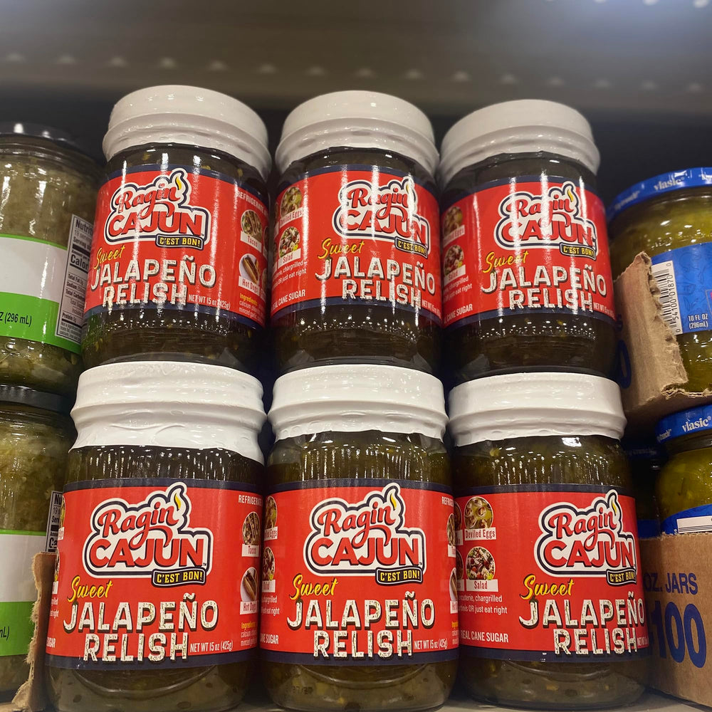Ragin' Cajun raw jalapeño and garlic ingredients displayed, communicates freshness