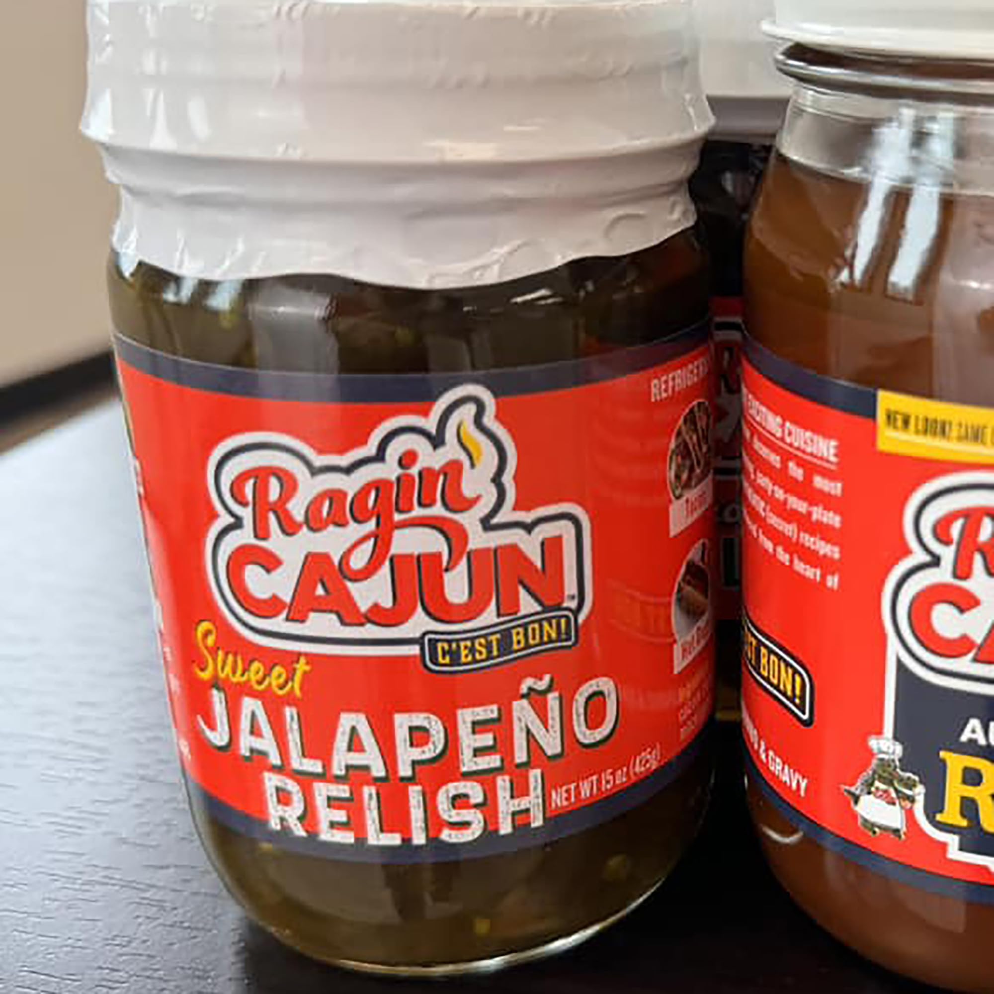 Ragin' Cajun size comparison with common items, brand 15 oz scale and portion guide