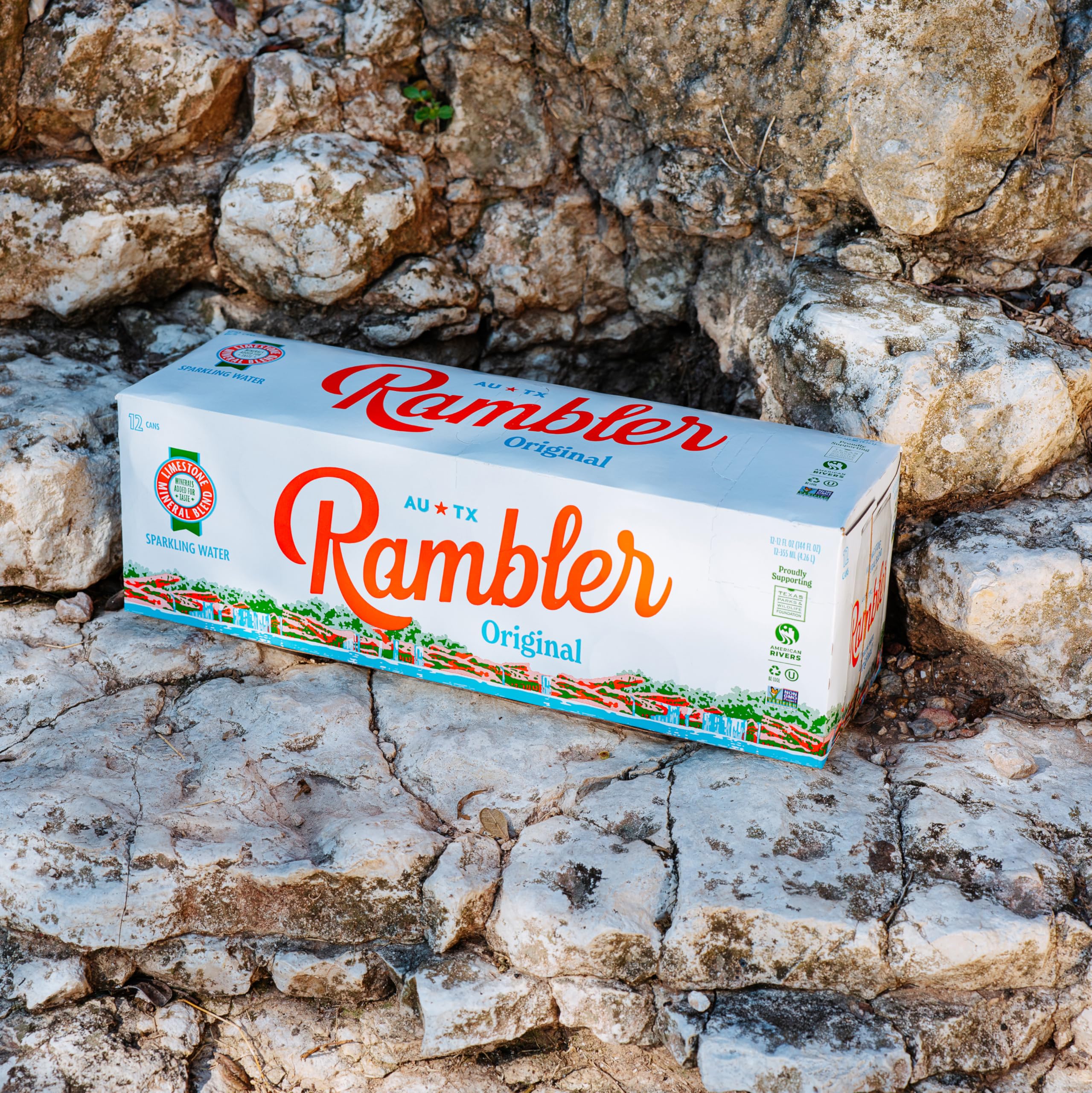 RAMBLER AUTX can in hand showing 12oz scale and convenience