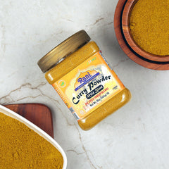 Rani brand open jar revealing fresh aromatic curry powder inside