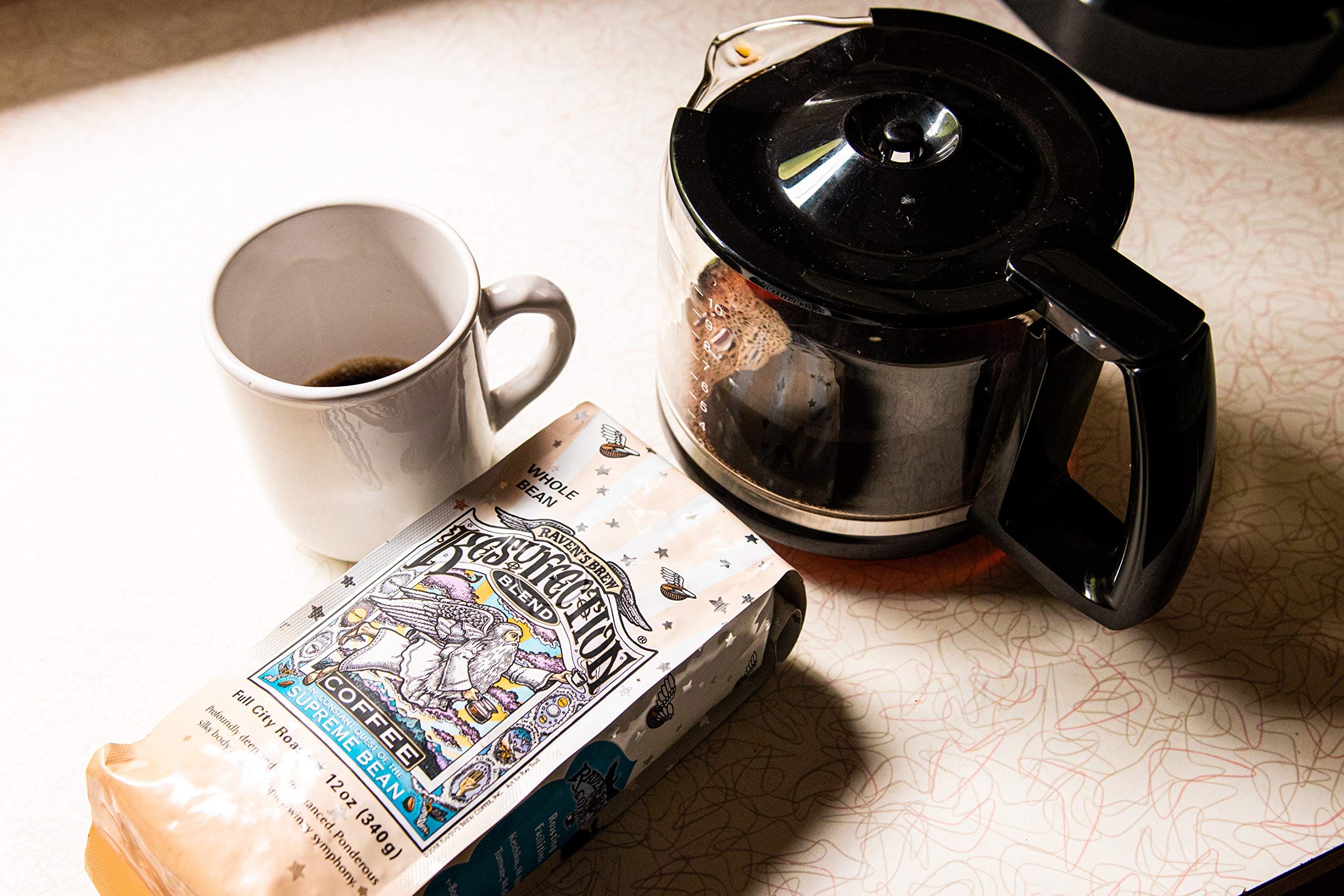 Detail of Raven's Brew one-way valve and resealable bag, preserves aroma and freshness