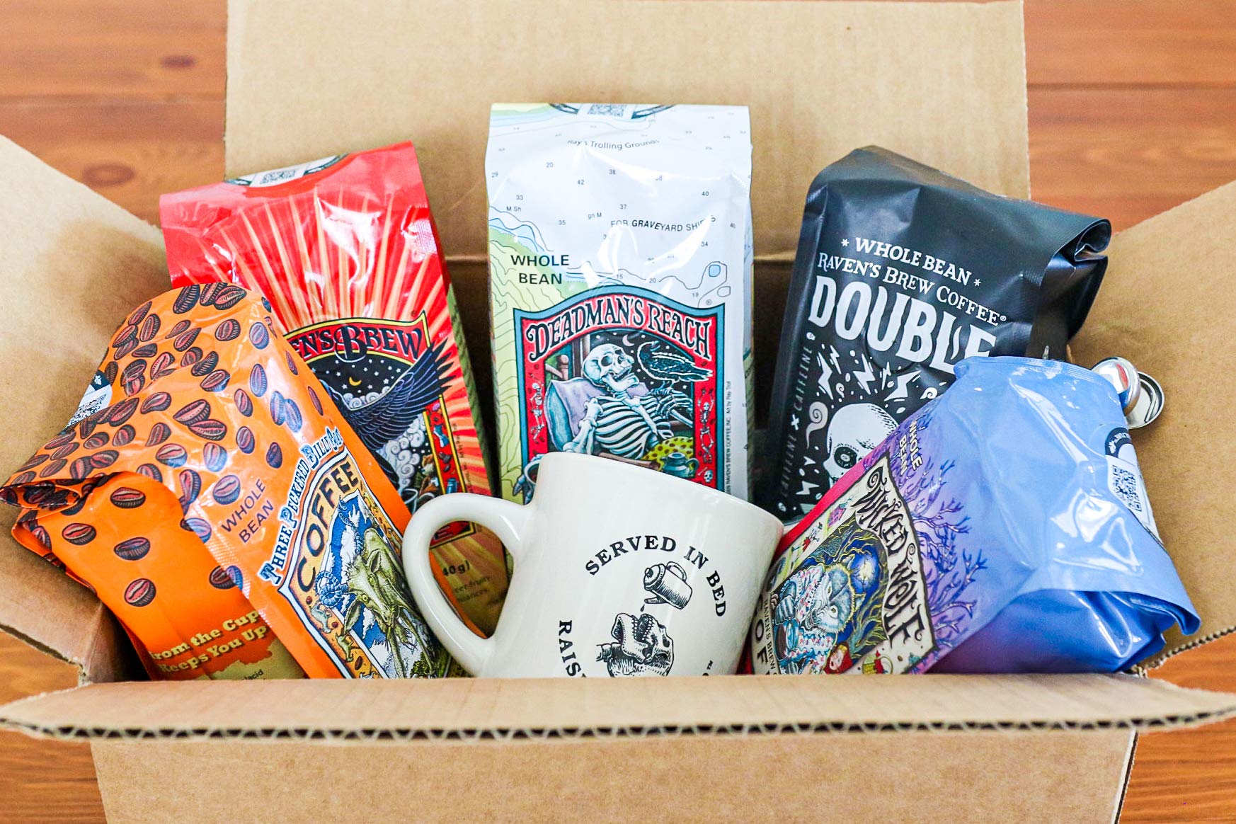 Raven's Brew 12oz bag next to a measuring scale, clarifies actual size and portioning