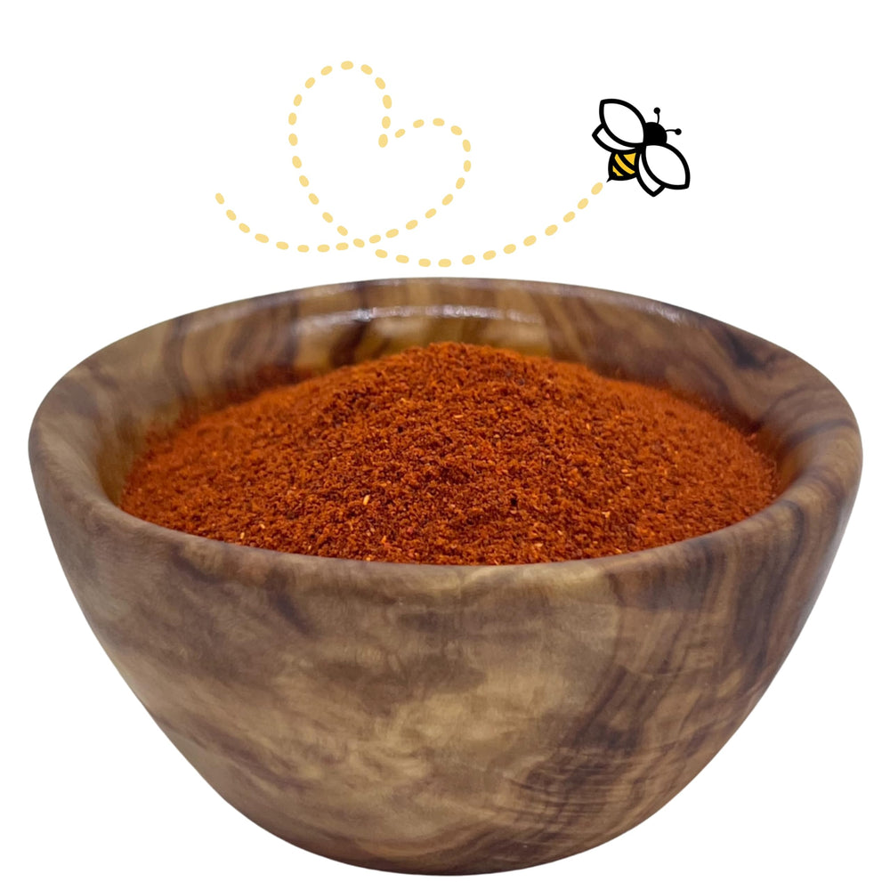 Raw Essentials powder close-up of fine texture and rusty red color, shows quality