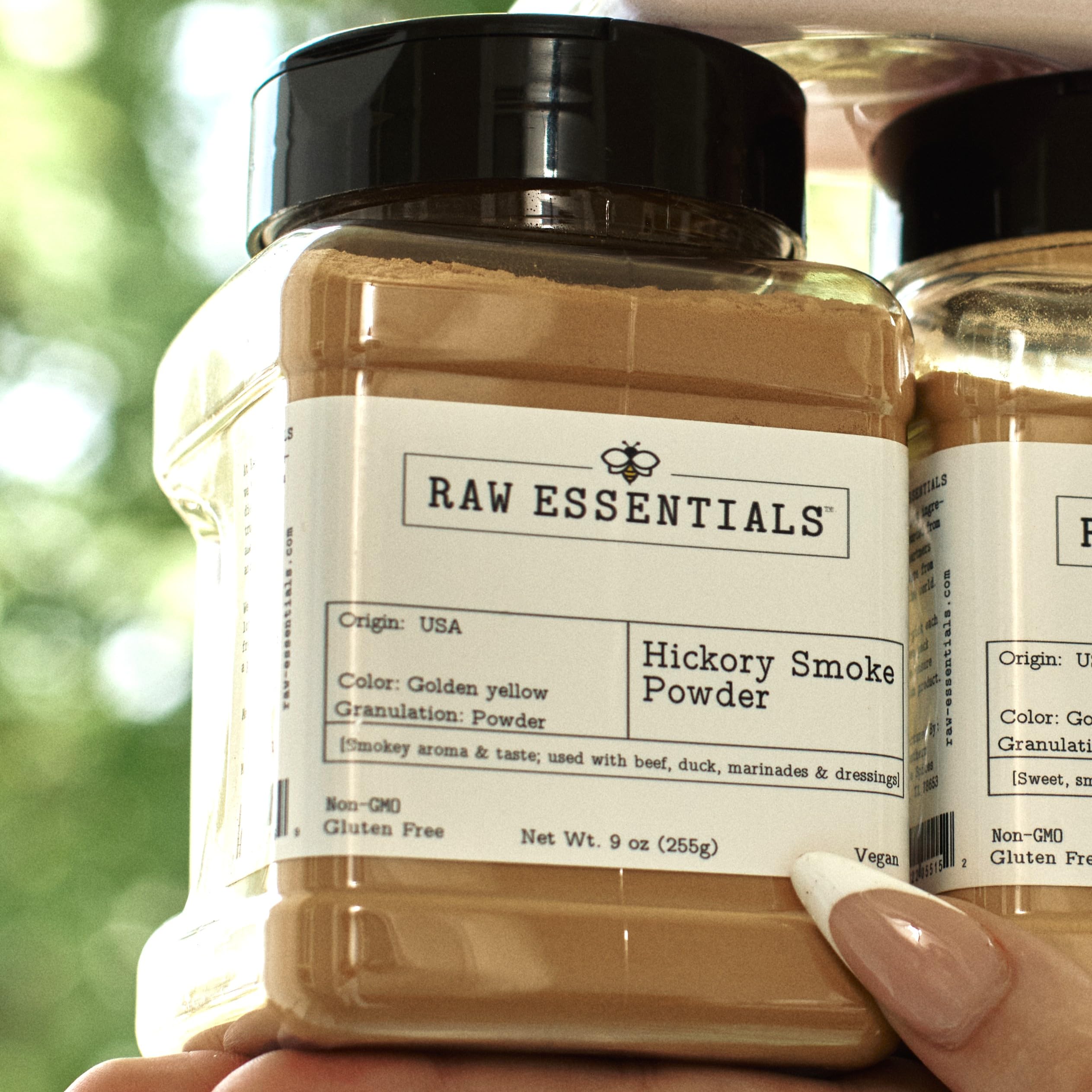 Raw Essentials bottle open top view with powder visible for easy dispensing benefit