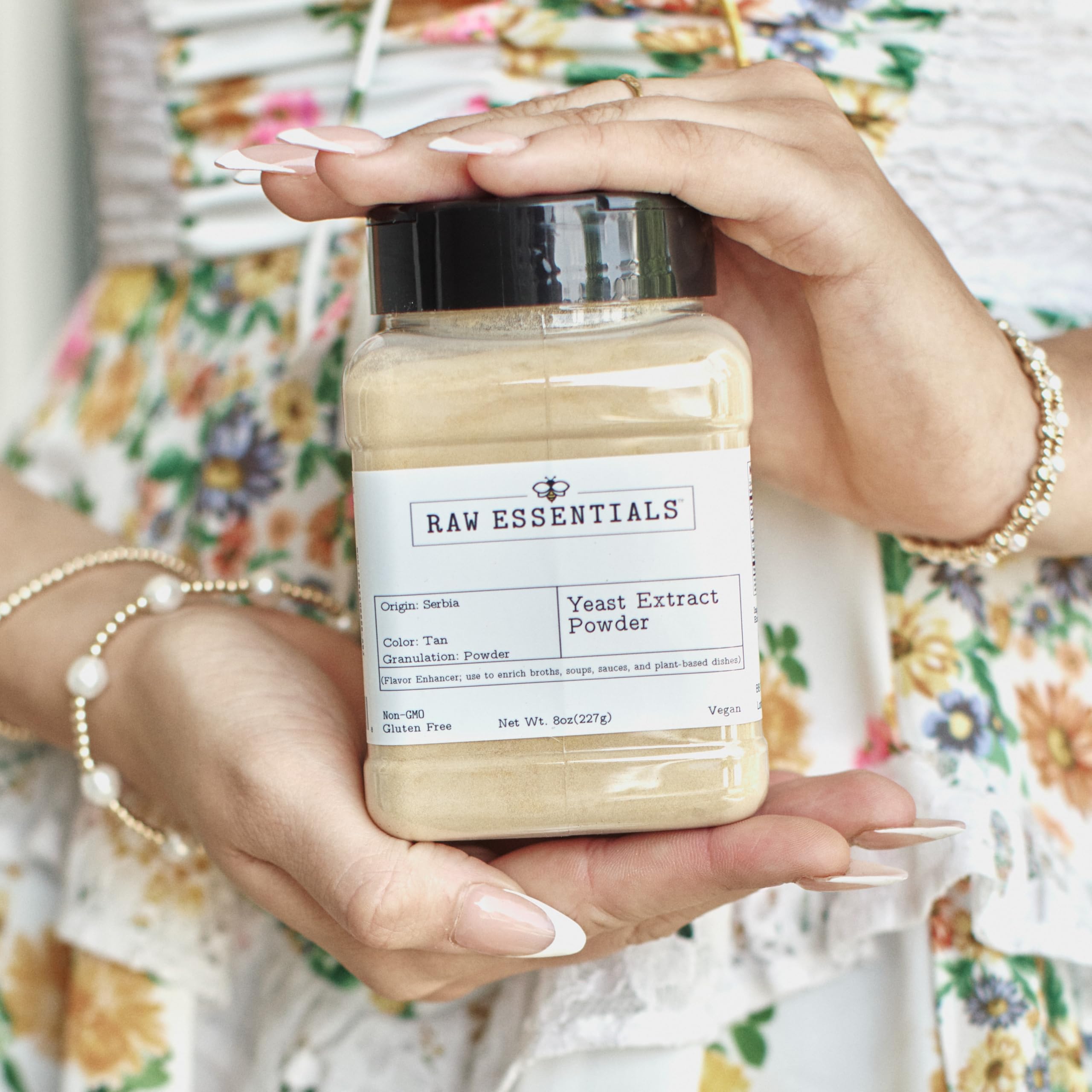 Raw Essentials bottle beside vegetables and spices, quick pantry ingredient