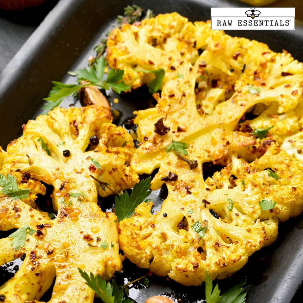 Raw Essentials sprinkled on popcorn for snack enhancement and savory flavor