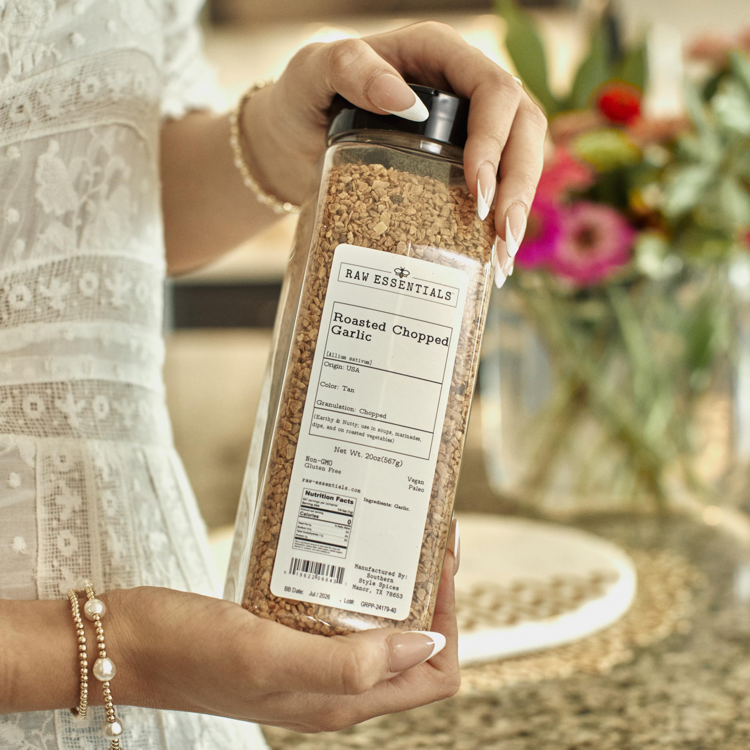 Raw Essentials pouring into simmering sauce, benefit: quickly seasons and blends into recipes