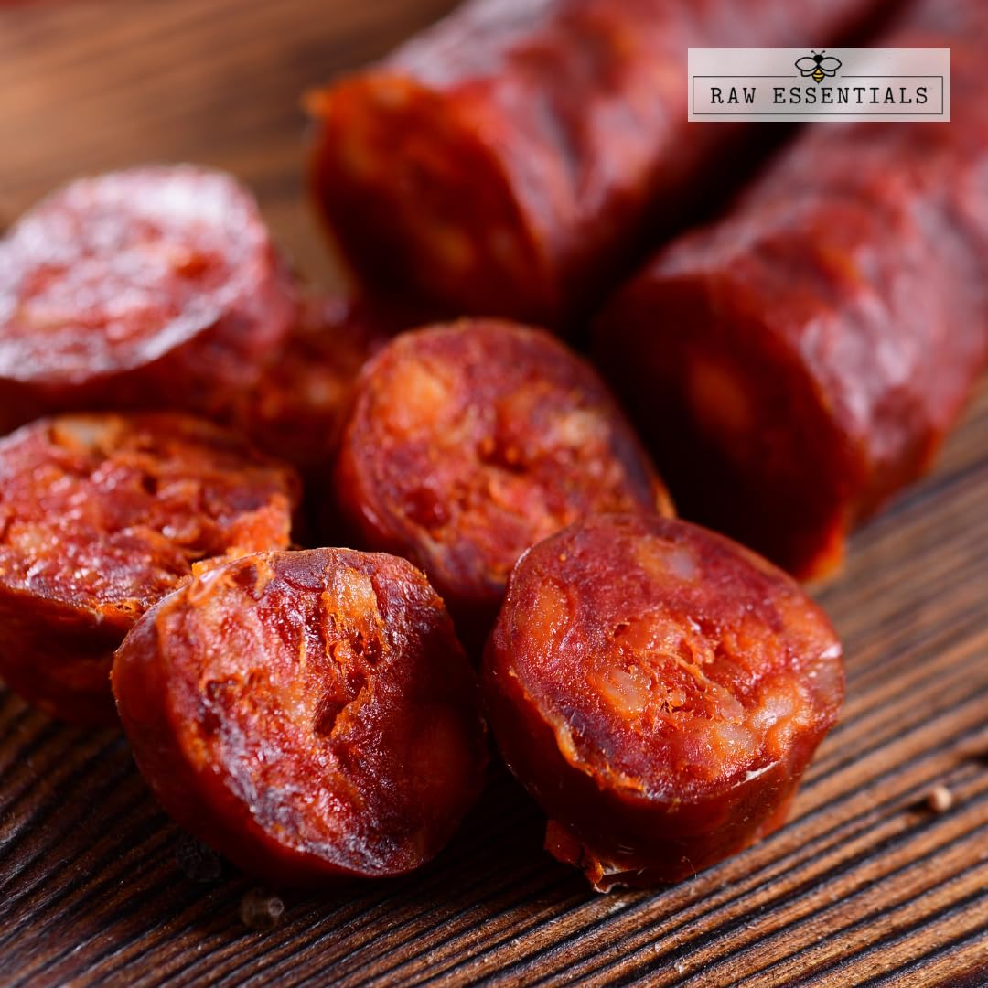 Raw Essentials smoked paprika on spoon showing measured amount for recipes and controlled seasoning benefit