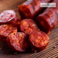 Raw Essentials smoked paprika on spoon showing measured amount for recipes and controlled seasoning benefit