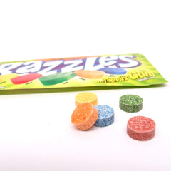 softened Razzles piece showing gum texture and chewable enjoyment benefit