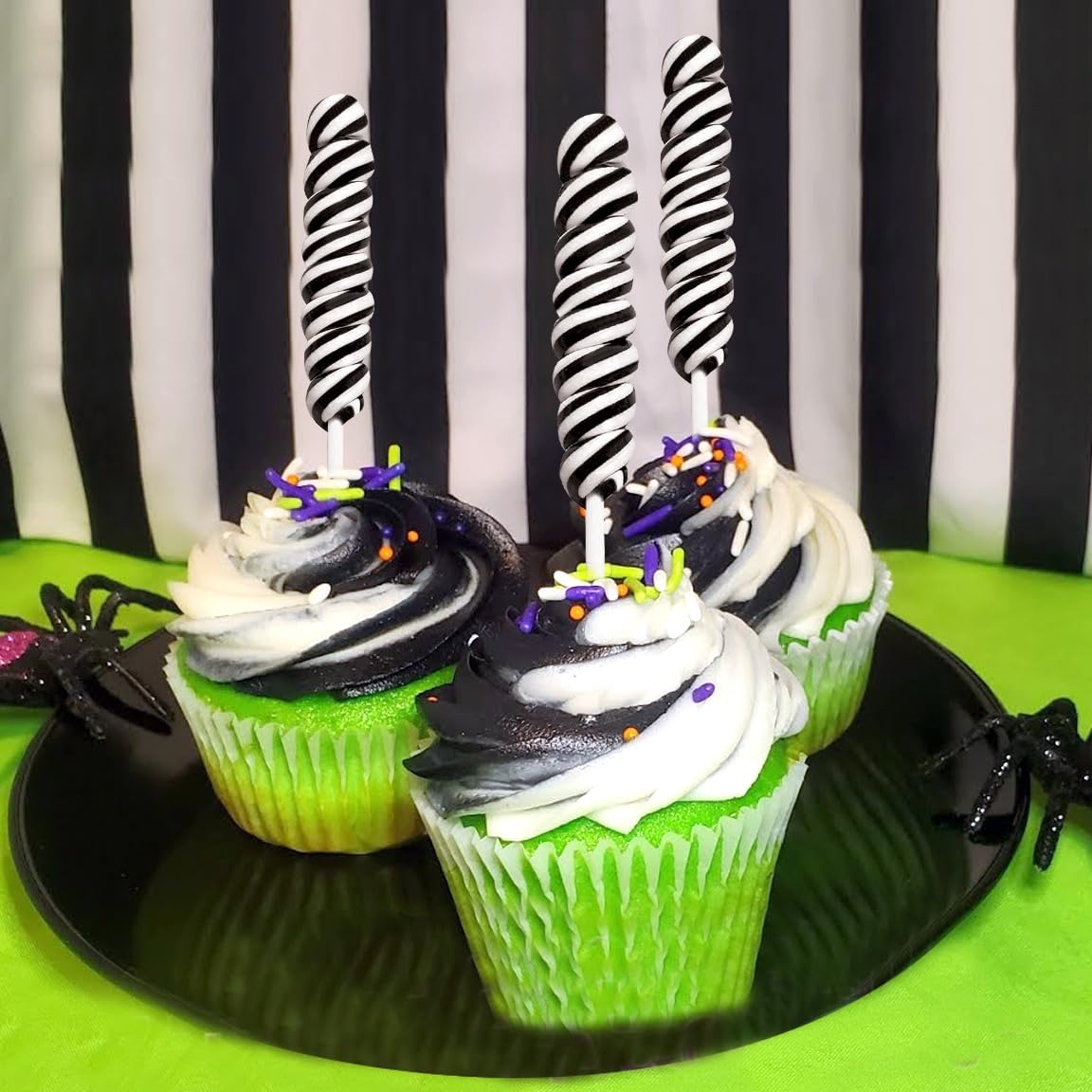 RBBZ Party styled candy buffet with black suckers creating bold contrast and elegant display