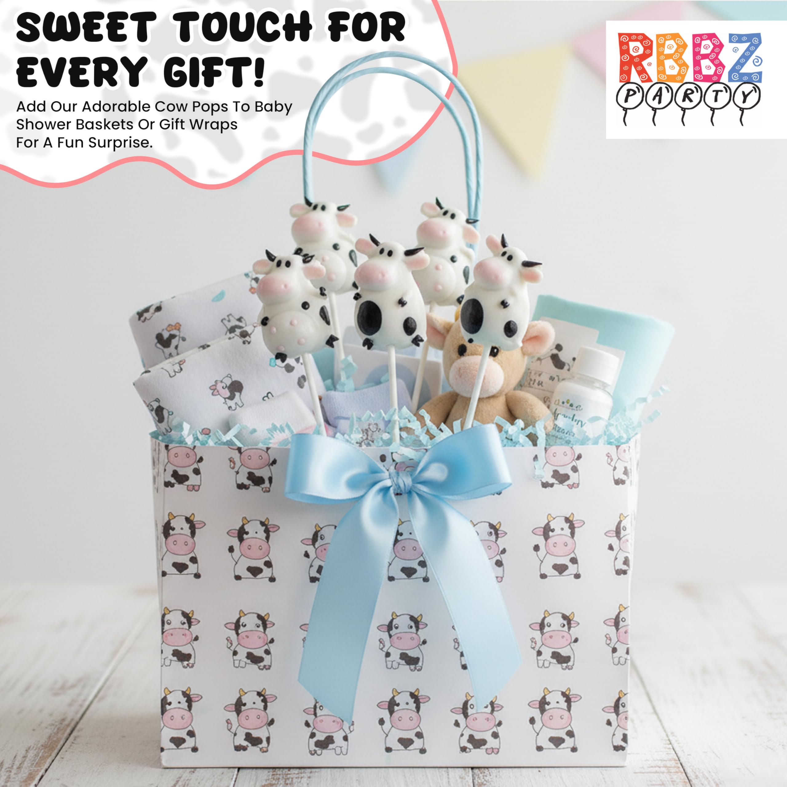 RBBZ Party hand holding a cow lollipop showing scale and kid-friendly size