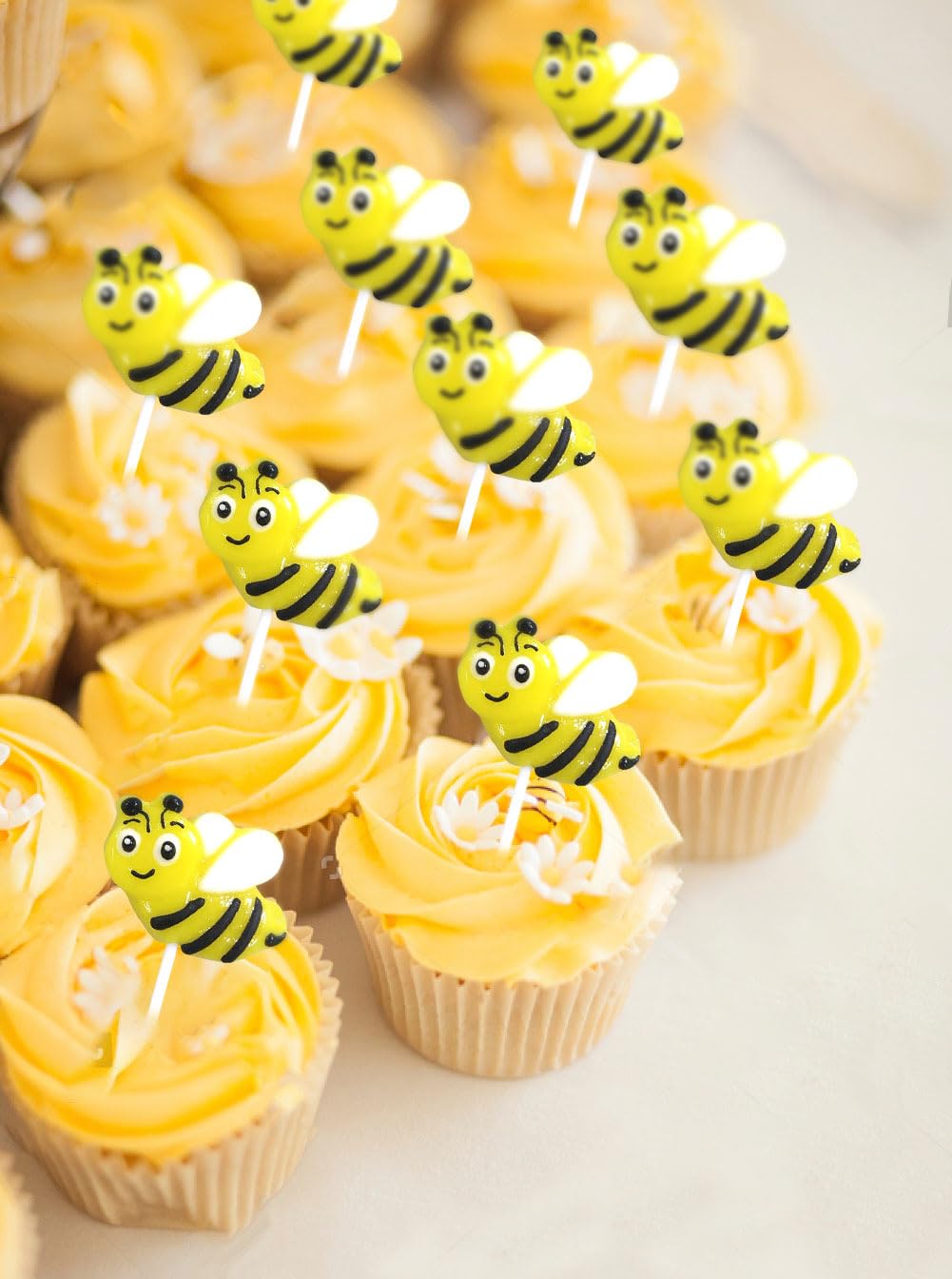 RBBZ Party bee lollipop inserted in cupcake for a decorative edible topper and quick styling