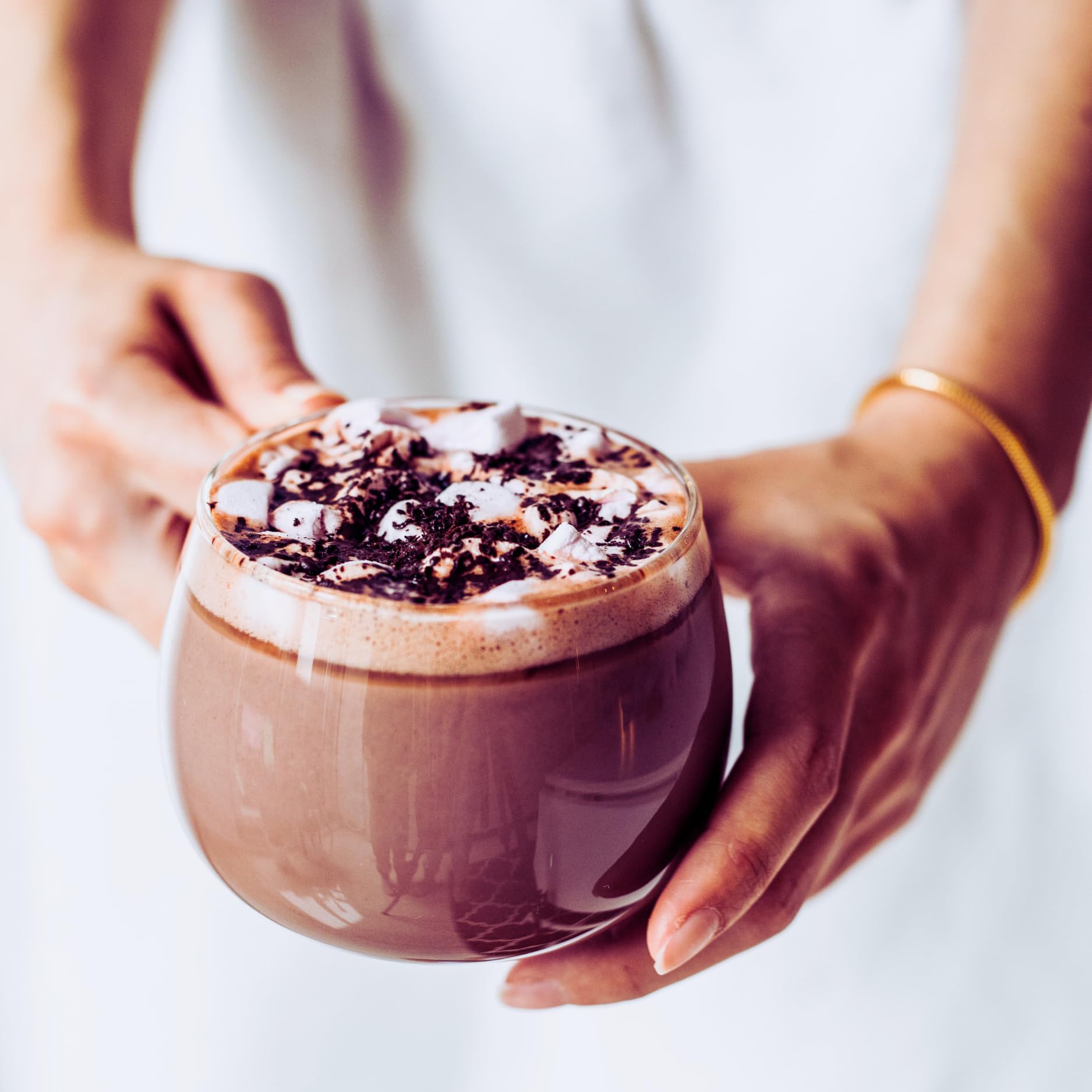 REAL COFFEE GREAT TASTE brewed cup of hot chocolate demonstrating creamy texture and indulgence