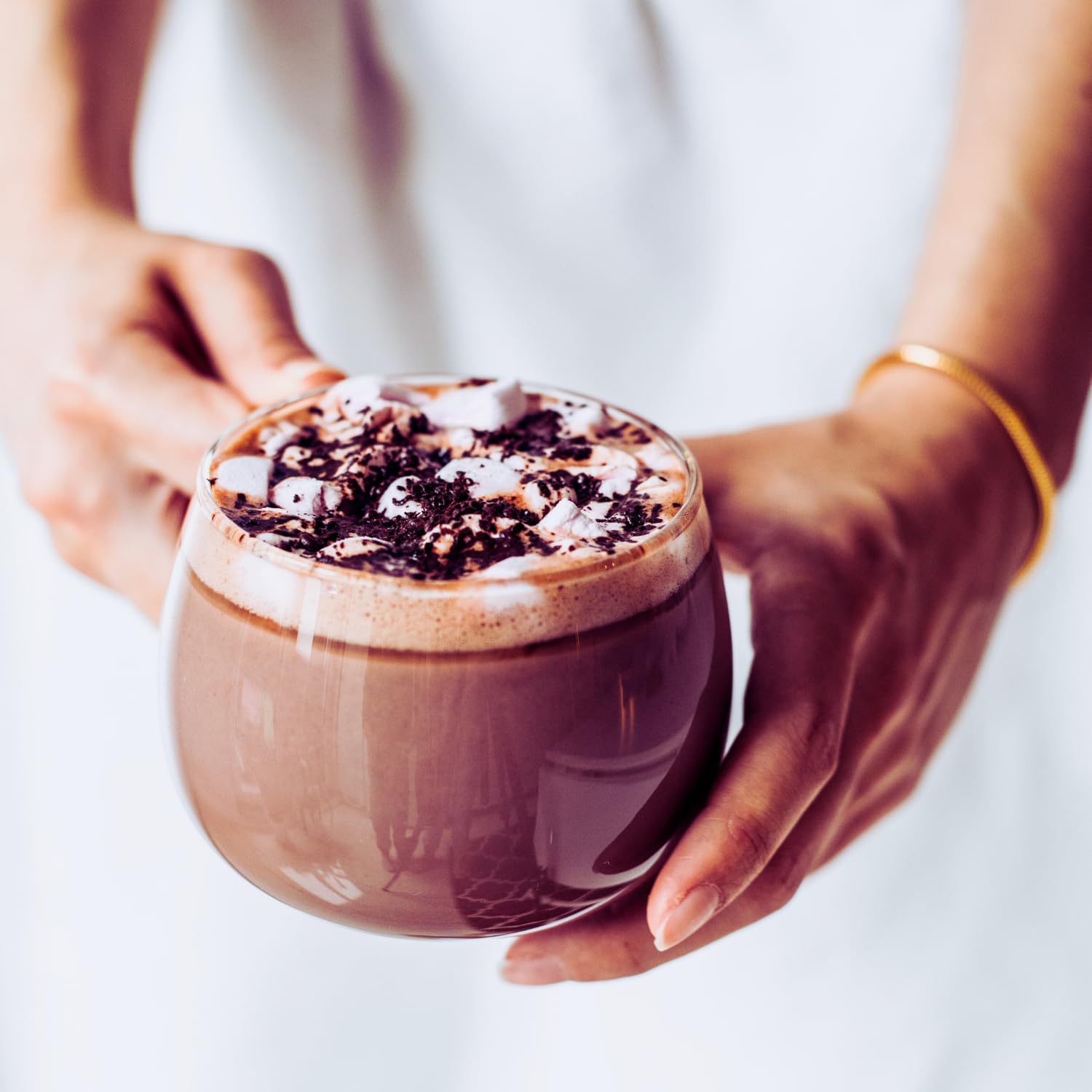 REAL COFFEE GREAT TASTE cup of hot chocolate showing creamy texture and comfort