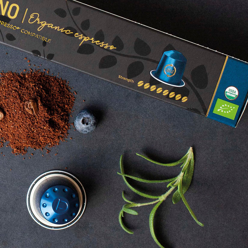 REAL COFFEE GREAT TASTE Milano served beside croissant in breakfast setting showcasing morning enjoyment